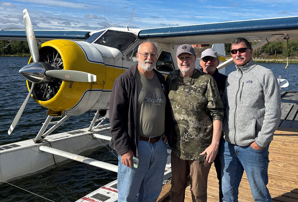 Murray Group in front of their plane